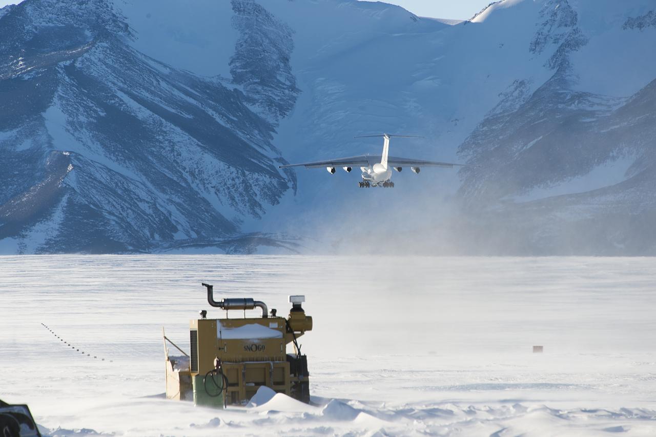 plane taking off from an ice runway in antarctica